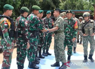 Satgas Pamtas dan RAMD Malaysia Perkuat Pengamanan Perbatasan